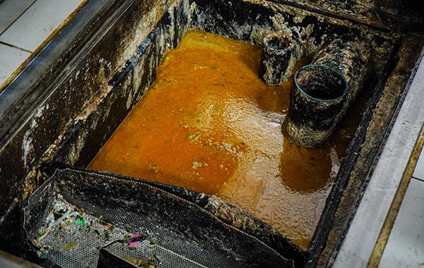 delaying grease trap cleaning can cause foul odors, sanitation problems, and pricey repairs